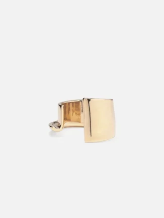 Il bracciale J Bracciale rigido con “J” scolpita Il bracciale J Bracciale rigido con “J” scolpita