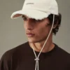 Il cappellino Artichaut Cappellino da baseball con frange
