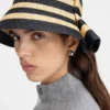 Il cappello Vela Cappello a secchiello in rafia piegato