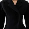 Il cappotto Curvo Cappotto con spalle arrotondate