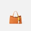 La banana Ciondolo per borsa a forma di banana annodata La banana Ciondolo per borsa a forma di banana annodata