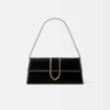 La borsa lunga Bambino Long con patta metallica La borsa lunga Bambino Long con patta metallica