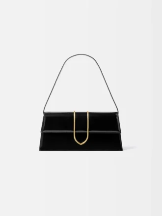 La borsa lunga Bambino Long con patta metallica