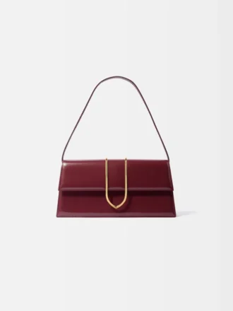 La borsa lunga Bambino Long con patta metallica