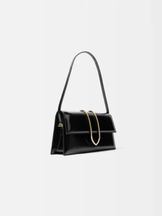 La borsa lunga Bambino Long con patta metallica