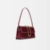 La borsa lunga Bambino Long con patta metallica La borsa lunga Bambino Long con patta metallica