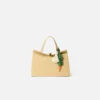 La carota Ciondolo per borsa a forma di carota annodata La carota Ciondolo per borsa a forma di carota annodata