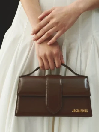 La grande borsa a tracolla con patta Bambino