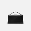 La grande borsa a tracolla con patta Bambino La grande borsa a tracolla con patta Bambino
