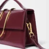 La grande borsa a tracolla con patta metallica Bambino La grande borsa a tracolla con patta metallica Bambino