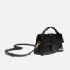 La grande borsa Bambino con tracolla regolabile La grande borsa Bambino con tracolla regolabile