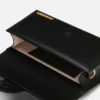 La grande borsa Bambino con tracolla regolabile La grande borsa Bambino con tracolla regolabile