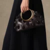 La piccola Calino con nodi Mini borsa a mano con anelli La piccola Calino con nodi Mini borsa a mano con anelli