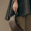 La piccola Ovalo Piccola borsa a tracolla pieghevole La piccola Ovalo Piccola borsa a tracolla pieghevole