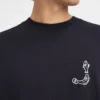 La t-shirt a maniche lunghe Merù T-shirt a maniche lunghe con logo Fisherman ricamato La t-shirt a maniche lunghe Merù T-shirt a maniche lunghe con logo Fisherman ricamato
