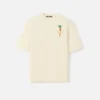 La t-shirt carota T-shirt con logo e toppa a forma di carota La t-shirt carota T-shirt con logo e toppa a forma di carota