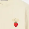 La t-shirt con le fragole T-shirt con logo e toppa con fragole