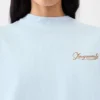 La t-shirt Corto T-shirt boxy ricamata La t-shirt Corto T-shirt boxy ricamata