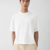 La t-shirt Torsade T-shirt con logo floccato La t-shirt Torsade T-shirt con logo floccato