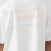 La t-shirt Torsade T-shirt con logo floccato La t-shirt Torsade T-shirt con logo floccato