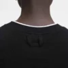La t-shirt Tricot T-shirt asimmetrica in maglia La t-shirt Tricot T-shirt asimmetrica in maglia