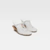 Le scarpe a doppia trama Mules doppie intrecciate Le scarpe a doppia trama Mules doppie intrecciate