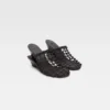 Le scarpe a doppia trama Mules doppie intrecciate