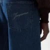 Pantaloni in denim Espiral de-Nîmes Jeans con cuciture intrecciate Pantaloni in denim Espiral de-Nîmes Jeans con cuciture intrecciate