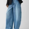 Pantaloni in denim Ovalo de-Nîmes Jeans curvi a vita alta Pantaloni in denim Ovalo de-Nîmes Jeans curvi a vita alta