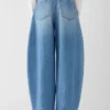 Pantaloni in denim Ovalo de-Nîmes Jeans curvi a vita alta Pantaloni in denim Ovalo de-Nîmes Jeans curvi a vita alta