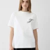 The Logo t-shirt T-shirt a maniche corte con loghi ricamati The Logo t-shirt T-shirt a maniche corte con loghi ricamati