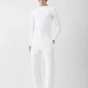 Top con collo alto Jacquemus + Nike Top a maniche lunghe – Collaborazione Jacquemus + Nike Top con collo alto Jacquemus + Nike Top a maniche lunghe – Collaborazione Jacquemus + Nike