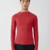 Top con collo alto Jacquemus + Nike Top a maniche lunghe – Collaborazione Jacquemus + Nike Top con collo alto Jacquemus + Nike Top a maniche lunghe – Collaborazione Jacquemus + Nike